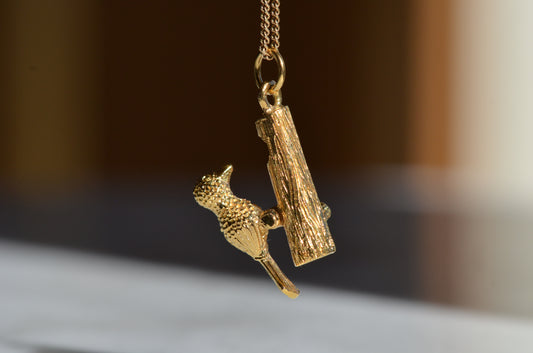 Playful Vintage Woodpecker Charm