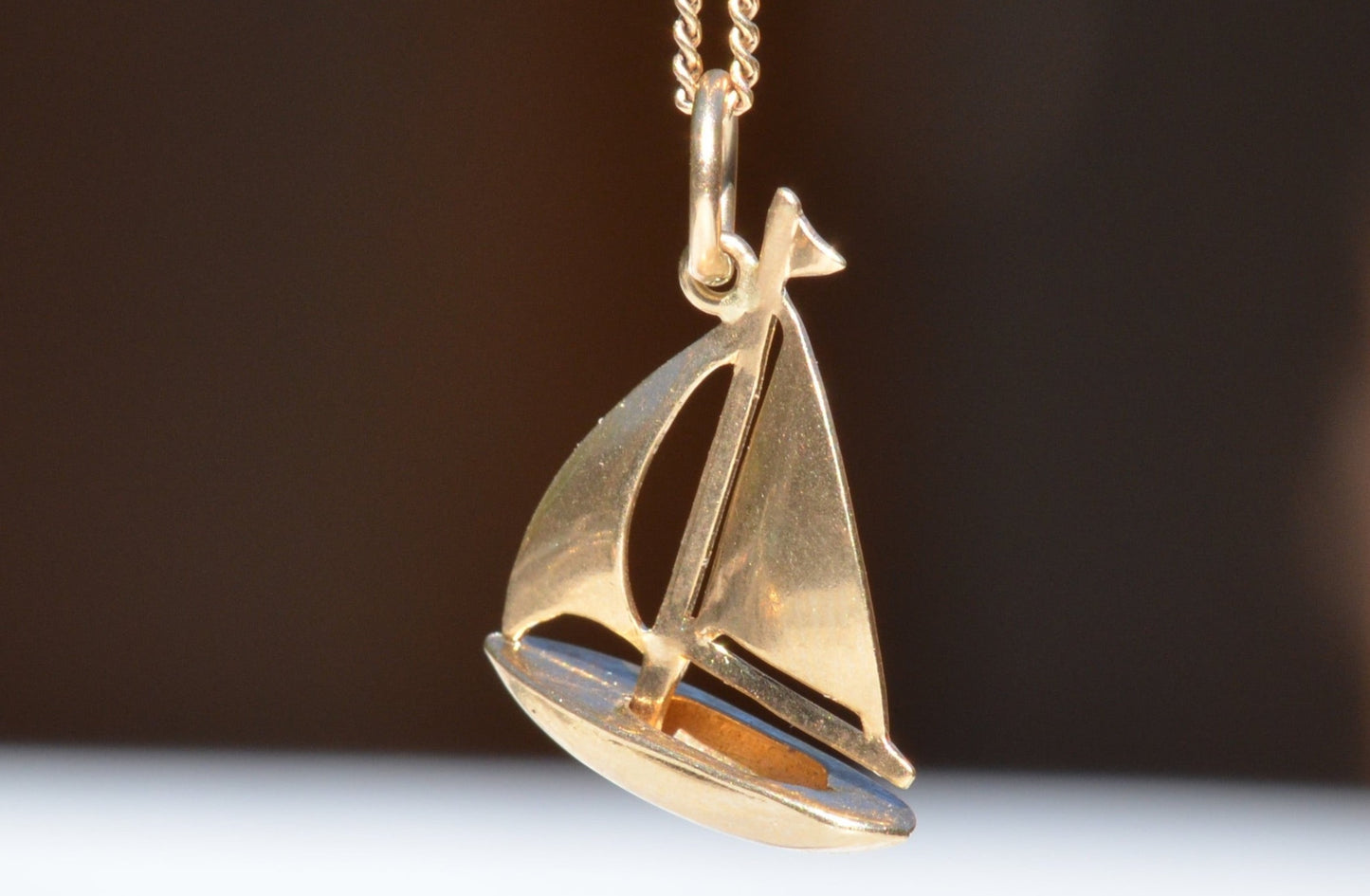 Serene Vintage Sailboat Charm