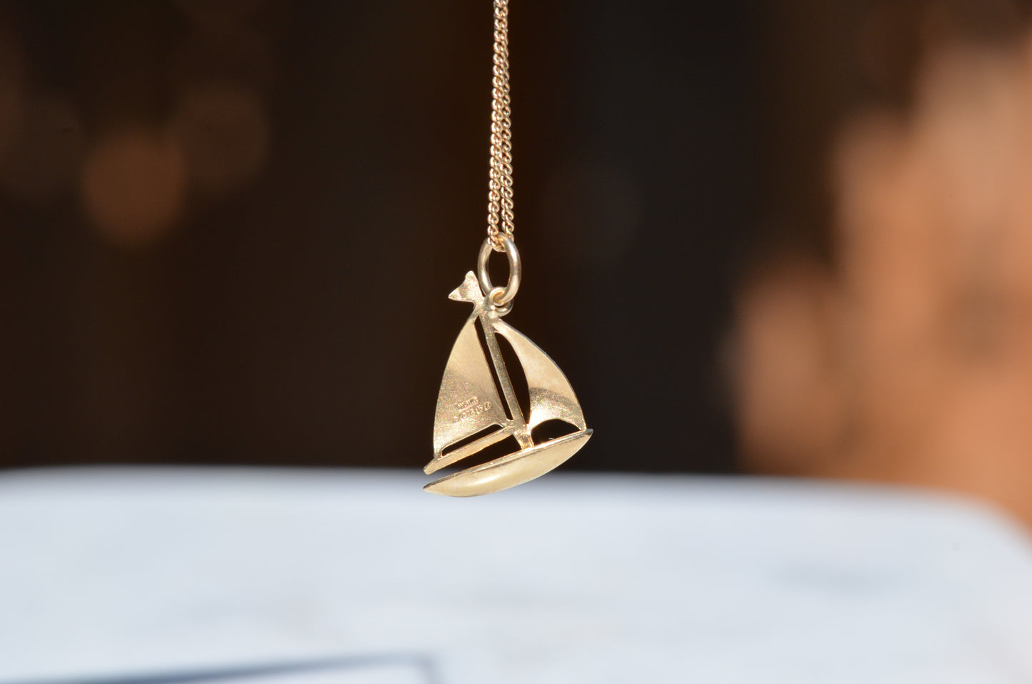 Serene Vintage Sailboat Charm