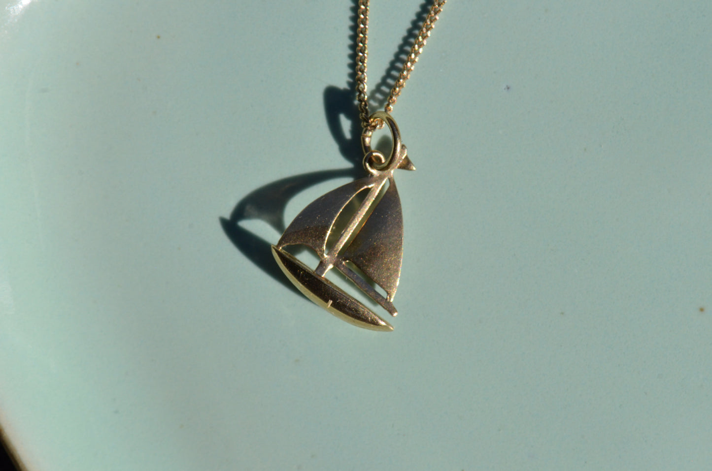 Serene Vintage Sailboat Charm