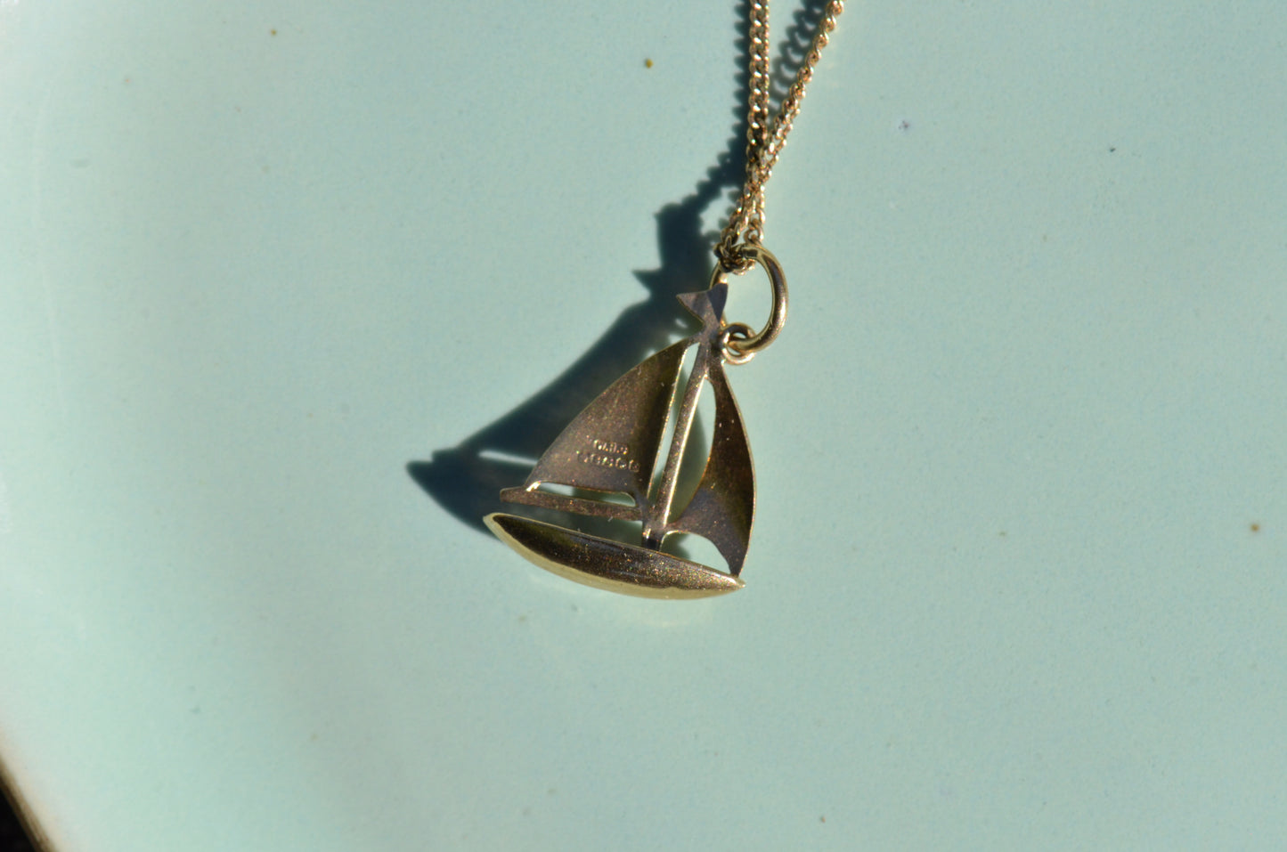 Serene Vintage Sailboat Charm