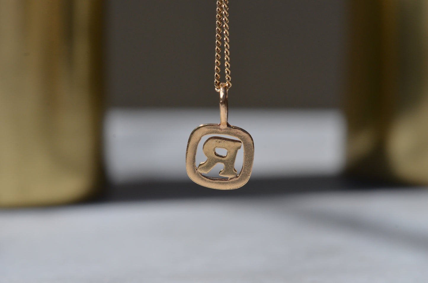 Sturdy "R" Pendant