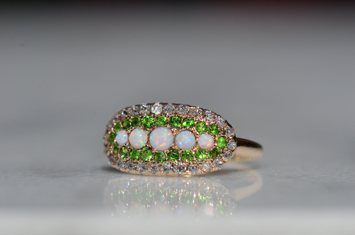 Dazzling Edwardian Opal, Demantoid Garnet, and Diamond Cluster Ring