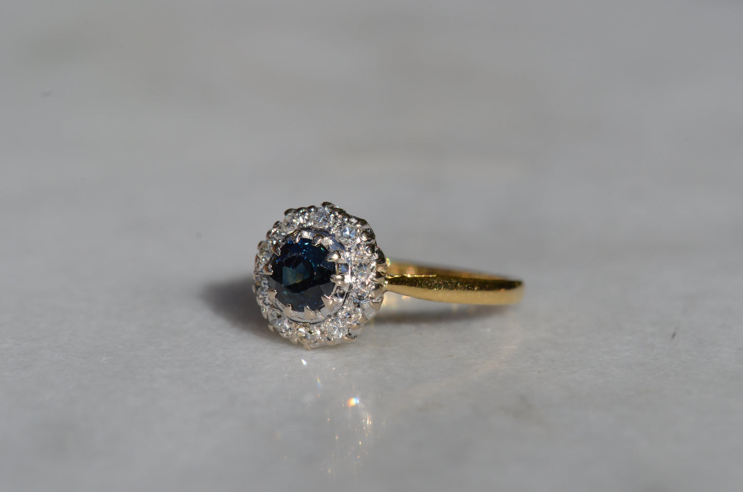 Rich Vintage Sapphire Diamond Halo Ring