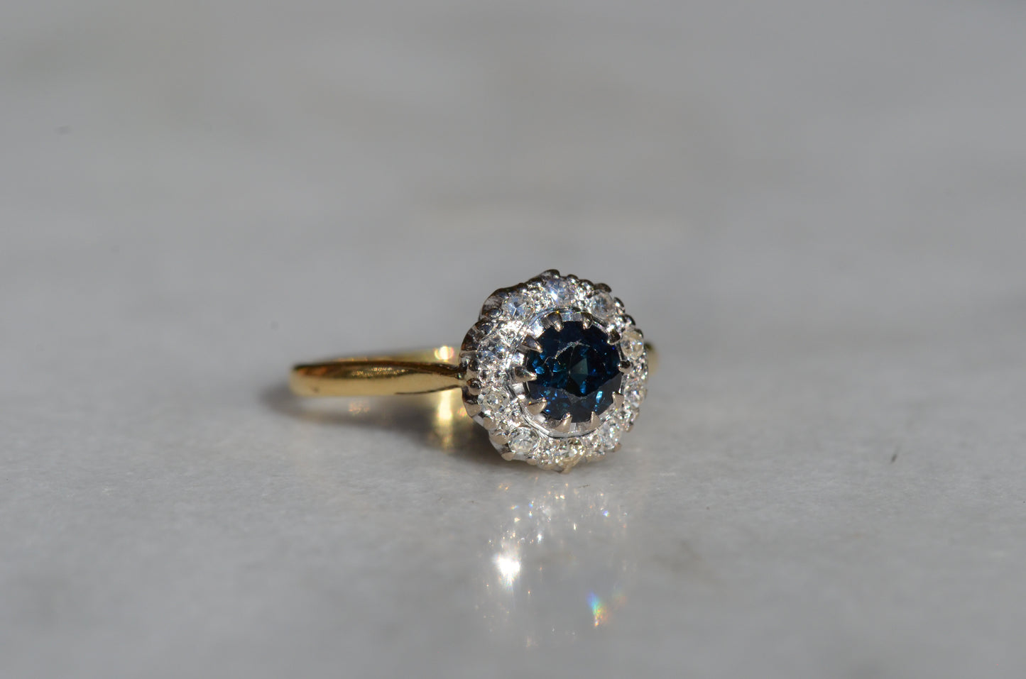 Rich Vintage Sapphire Diamond Halo Ring